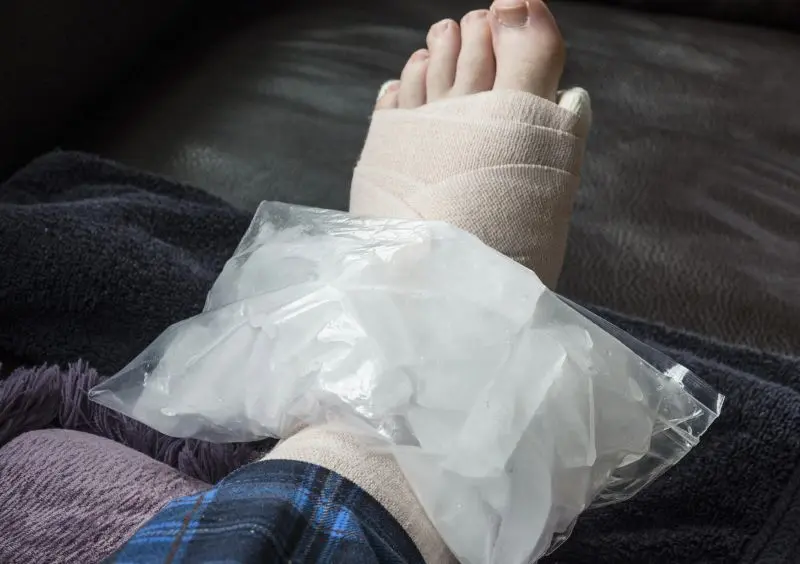 Apply ice for 15 to 20 minutes to calm throbbing heel pain