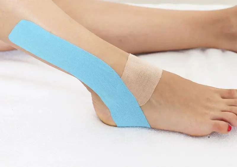 Kinesiology tape supports the arch while allowing full mobility