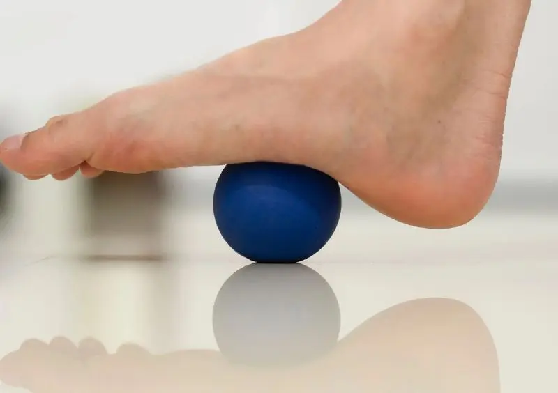 Rolling a frozen water bottle combines cooling and stretching